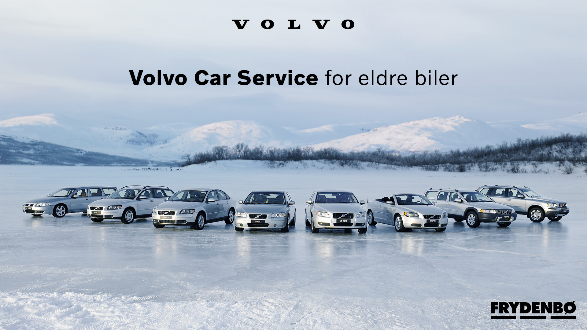 Eldre Volvo range stående på isen med snødekte fjell i bakgrunnen